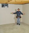 Peekskill basement insulation covered by EverLast wall paneling, with SilverGlo insulation underneath