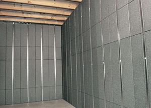 SilverGlo insulation and metal studs making up our Basement to Beautiful panels. Installed in Ossining.
